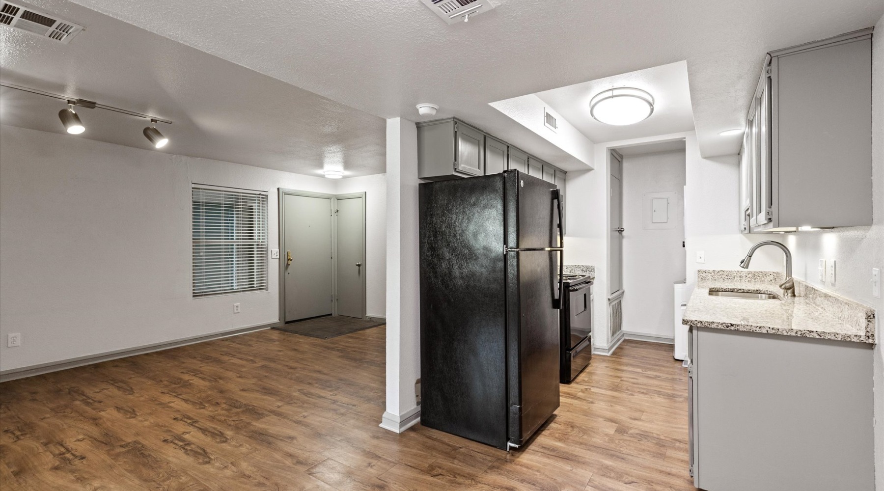 kitchen showing counterspace and bright lighting and modern appliances