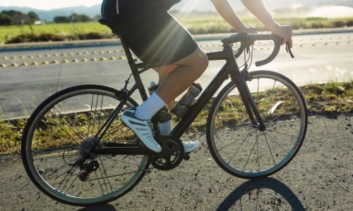 a person riding a bicycle outside